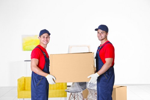 Office relocation planning in Hatchend with moving boxes and desks