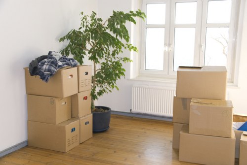 People organizing belongings in Hatchend storage space