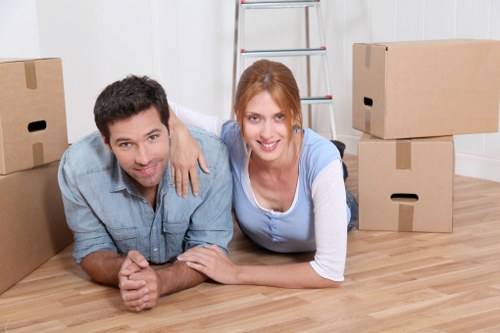 Professional movers loading furniture during a Hatchend relocation