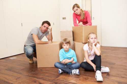 Careful packing of fragile home items by a local Hatchend service